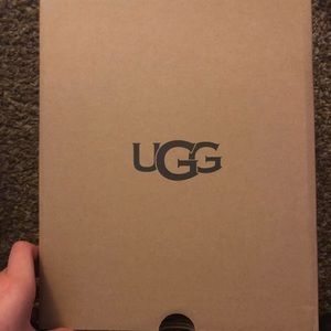 Black boys ugg boots, size 5Y